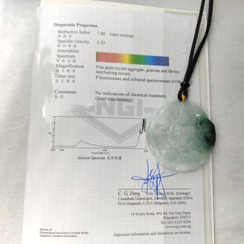 a necklace on a black string