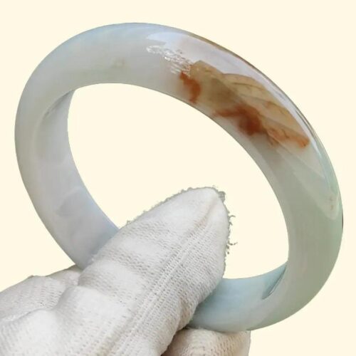 a hand holding a white gloved hand
