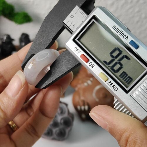 a person holding a small device