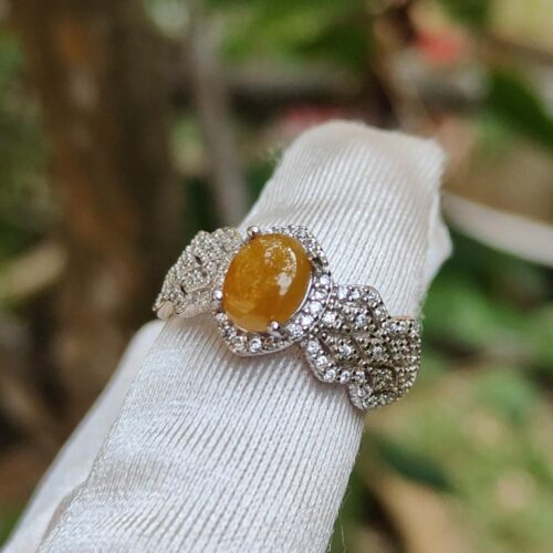 a ring on a white cloth