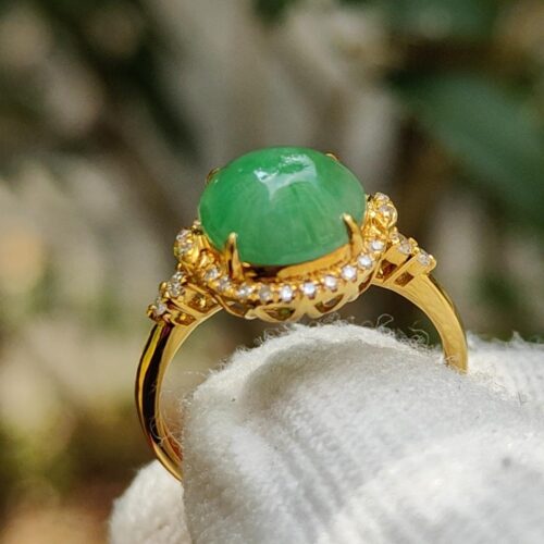 a ring with a green stone