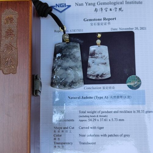 a necklace on a paper