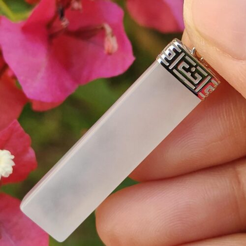 a hand holding a lighter