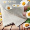 a hand holding a napkin
