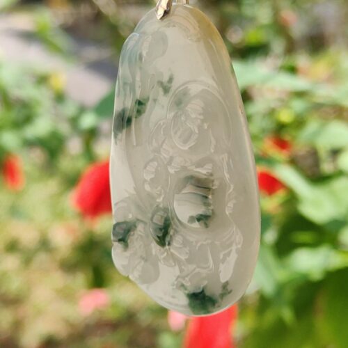 a jade pendant from a chain
