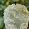 a jade pendant with a dragon design
