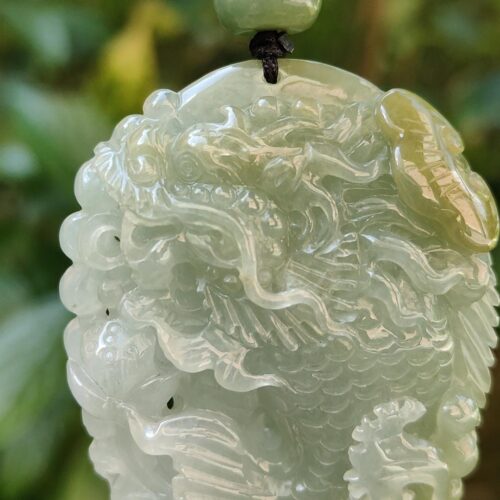 a jade pendant with a dragon design