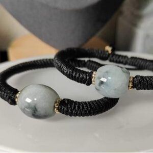 a black and white bracelet with beads