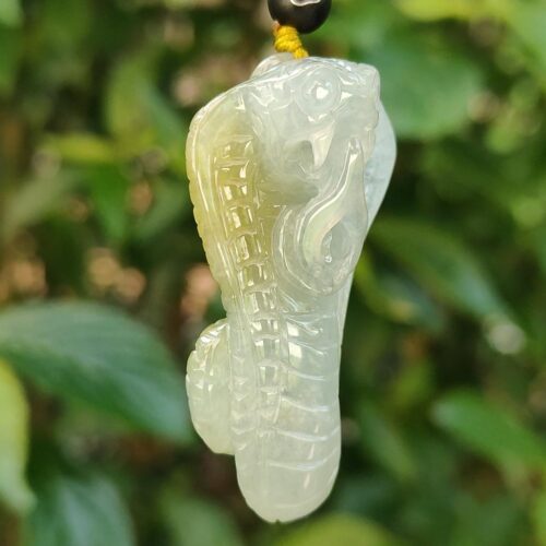 a jade pendant from a string