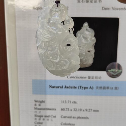 a jade pendant on a string