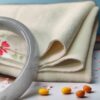 a white blanket and orange pills