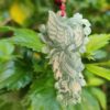 a jade pendant from a tree
