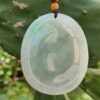a jade pendant from a string