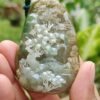 a hand holding a stone