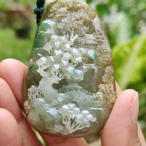 a hand holding a stone