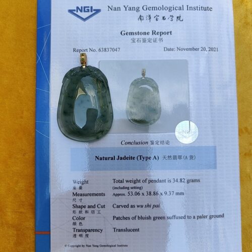 a piece of jewelry on a piece of paper