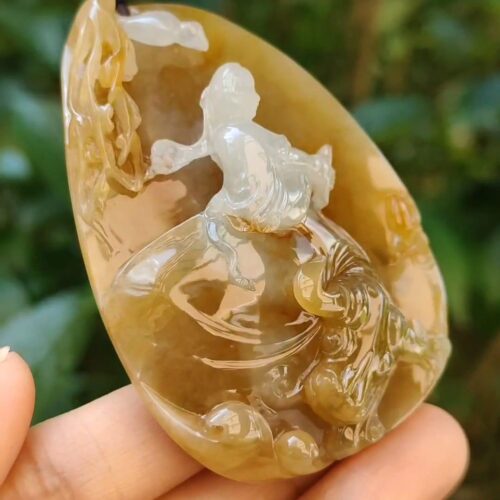 a hand holding a stone