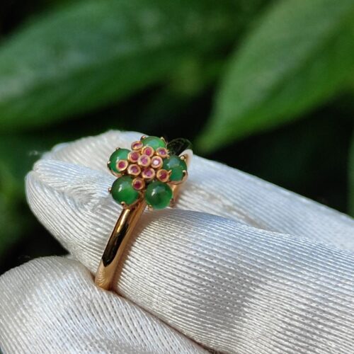 a hand holding a ring