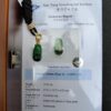 80f4a71bd731fa40cde7d2c249ca46af a green jade pendants on a black cord