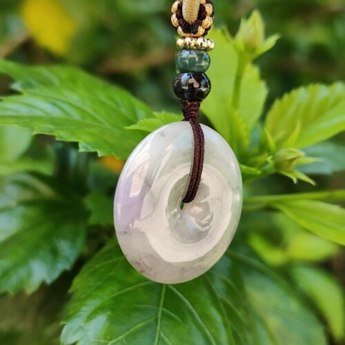 a stone pendant from a string