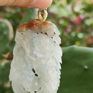 Carved with lizard, bat, peanut, coin and ruyi