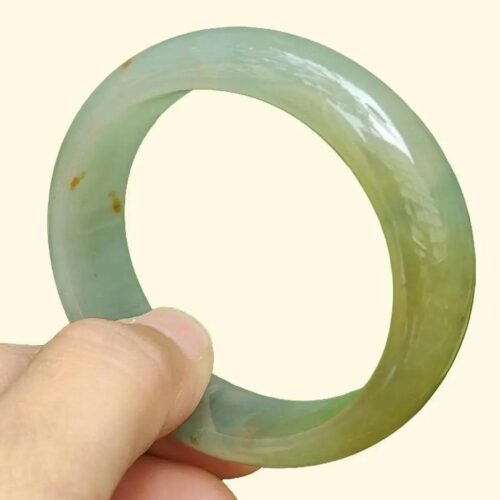 a person holding a ring