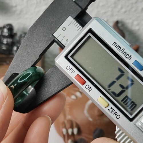 a person holding a small digital device