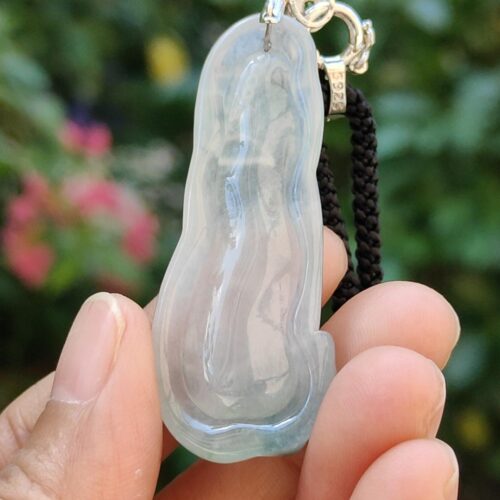 a hand holding a key chain