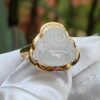 a ring with a carved stone on it