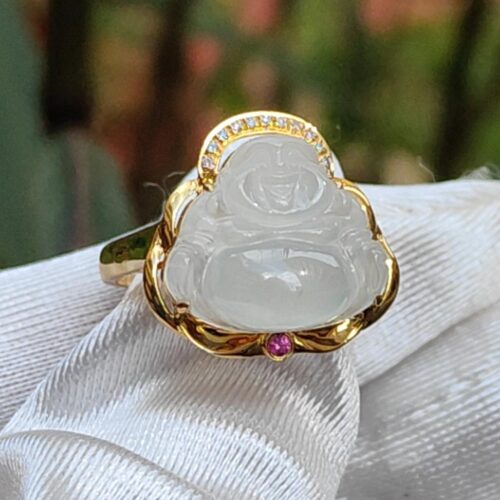 a ring with a carved stone on it