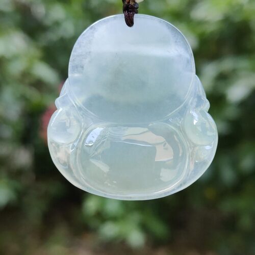 a clear round object from a branch