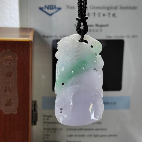 a jade pendant on a string