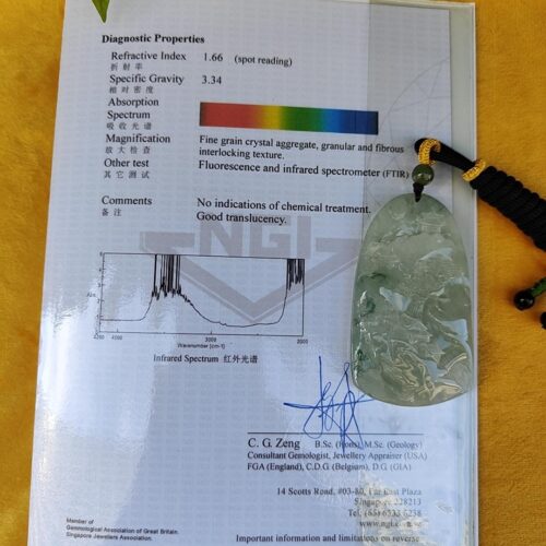 a piece of jewelry on a piece of paper