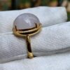 a ring with a stone on it