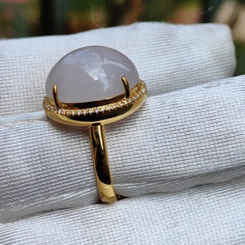 a ring with a stone on it