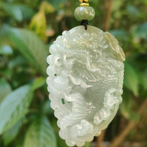 a jade pendant from a tree