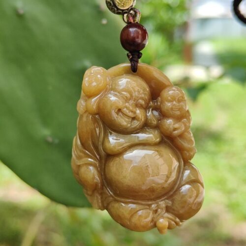 a jade pendant from a tree