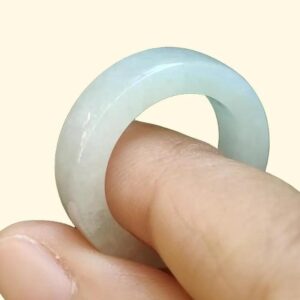 a finger with a ring on it