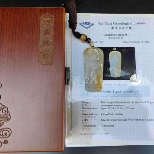 a book with a pendant on it