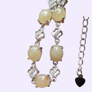 a bracelet with a heart charm