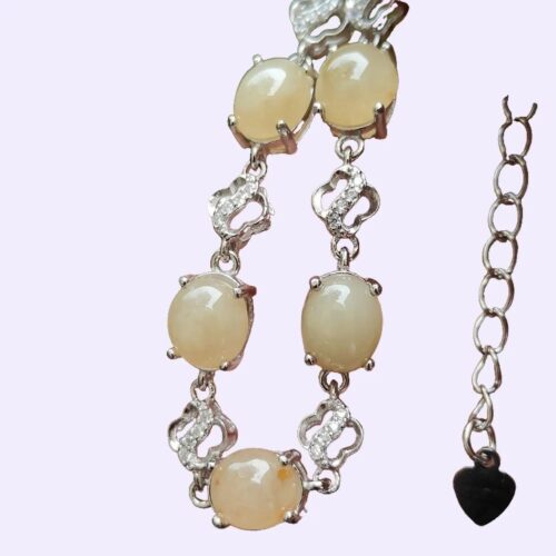 a bracelet with a heart charm