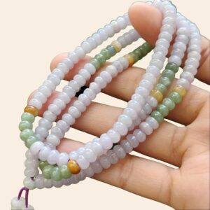 a person holding a necklace