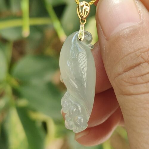 a hand holding a jade pendant - Squirrel Premium Quality with 18k Gold Clasp