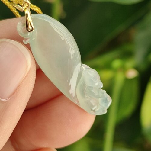 a hand holding a jade pendant - Squirrel Premium Quality with 18k Gold Clasp
