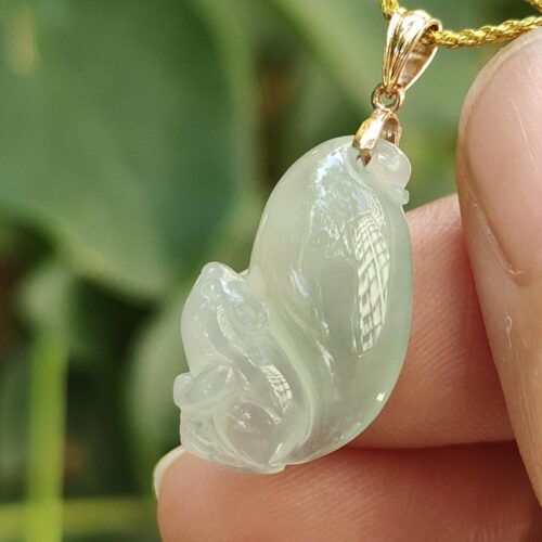 a hand holding a jade pendant - Squirrel Premium Quality with 18k Gold Clasp