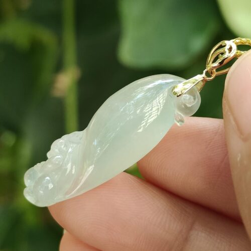 a hand holding a jade pendant - Squirrel Premium Quality with 18k Gold Clasp