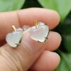 a person holding a pair of earrings - Heart Shape Cabochons - Apple Design