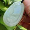 GUANYIN'S SECRET WEAPON Jadeite Pendant - Location: SG Jalan Meragi Park Simei HDB playground - Y.P.Q Certified reflective test 6
